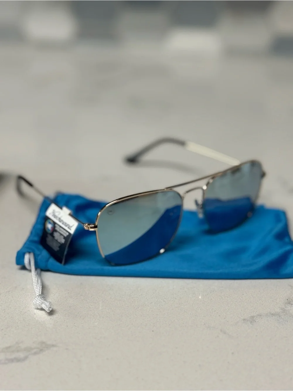 Mount Evans Gold Frame Sunglasses with Sky Blue Lenses